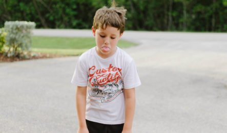 kid sticking out his tongue